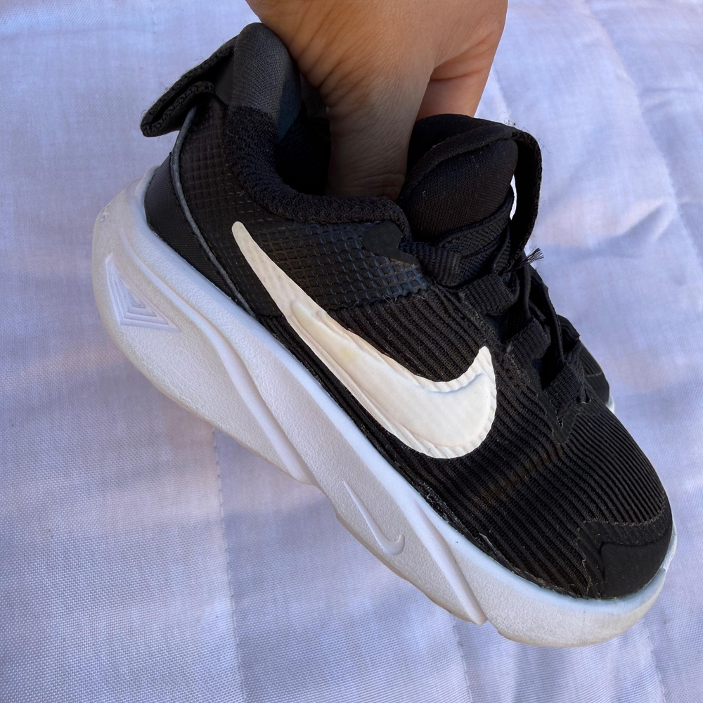 Kids Black and White Nike Sneakers
